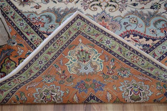 A Tabriz carpet 405 x 305cm